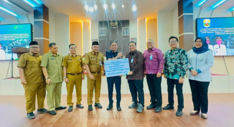 Lindungi 3.329 Pekerja Rentan dan Sawit, Pemkab Muaro Jambi Luncurkan Jaminan Sosial Ketenagakerjaan Berbasis DBH